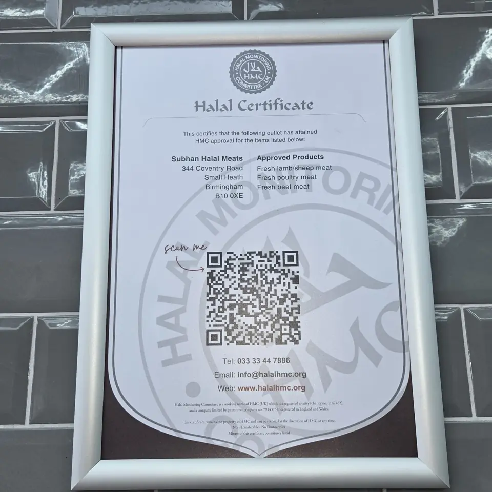 Subhan Halal Meats' HMC halal certificate in its frame on the shop wall: fresh lamb/sheep meat, fresh poultry meat and fresh beef meat